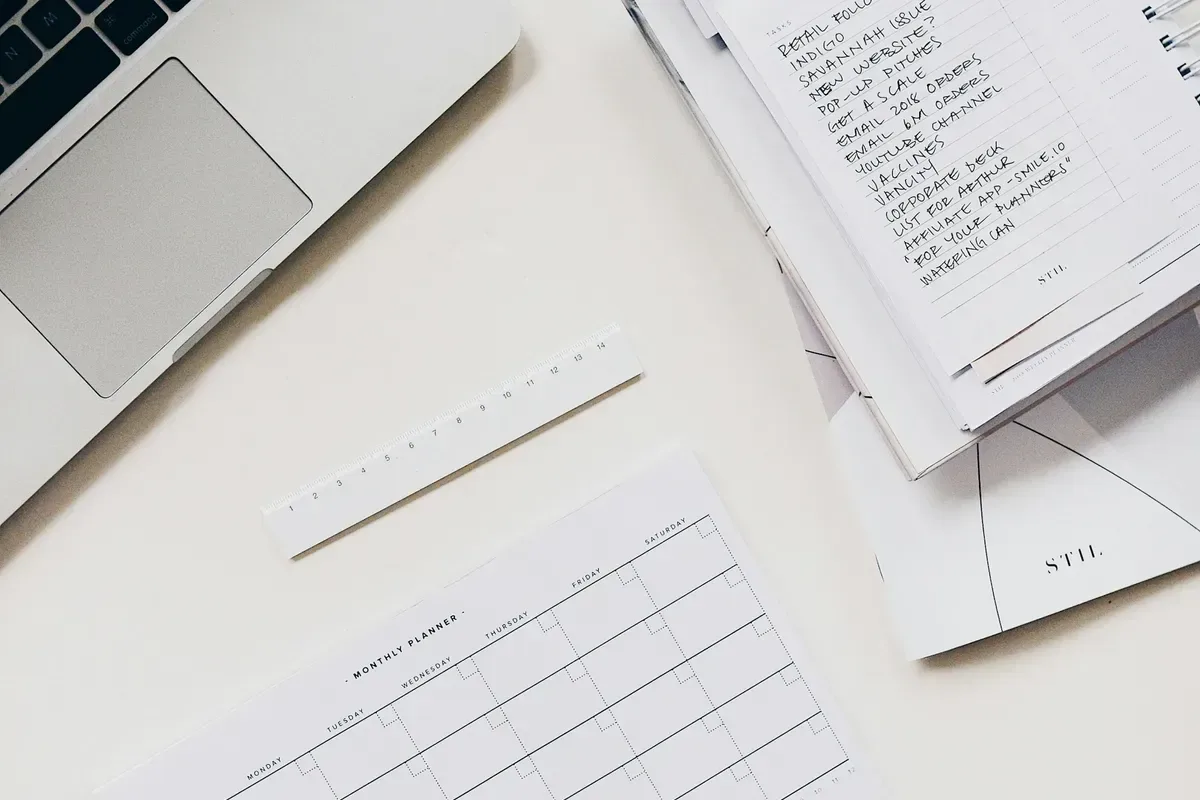 A calm, considered view of financial planning — reviewing investment growth at a desk.